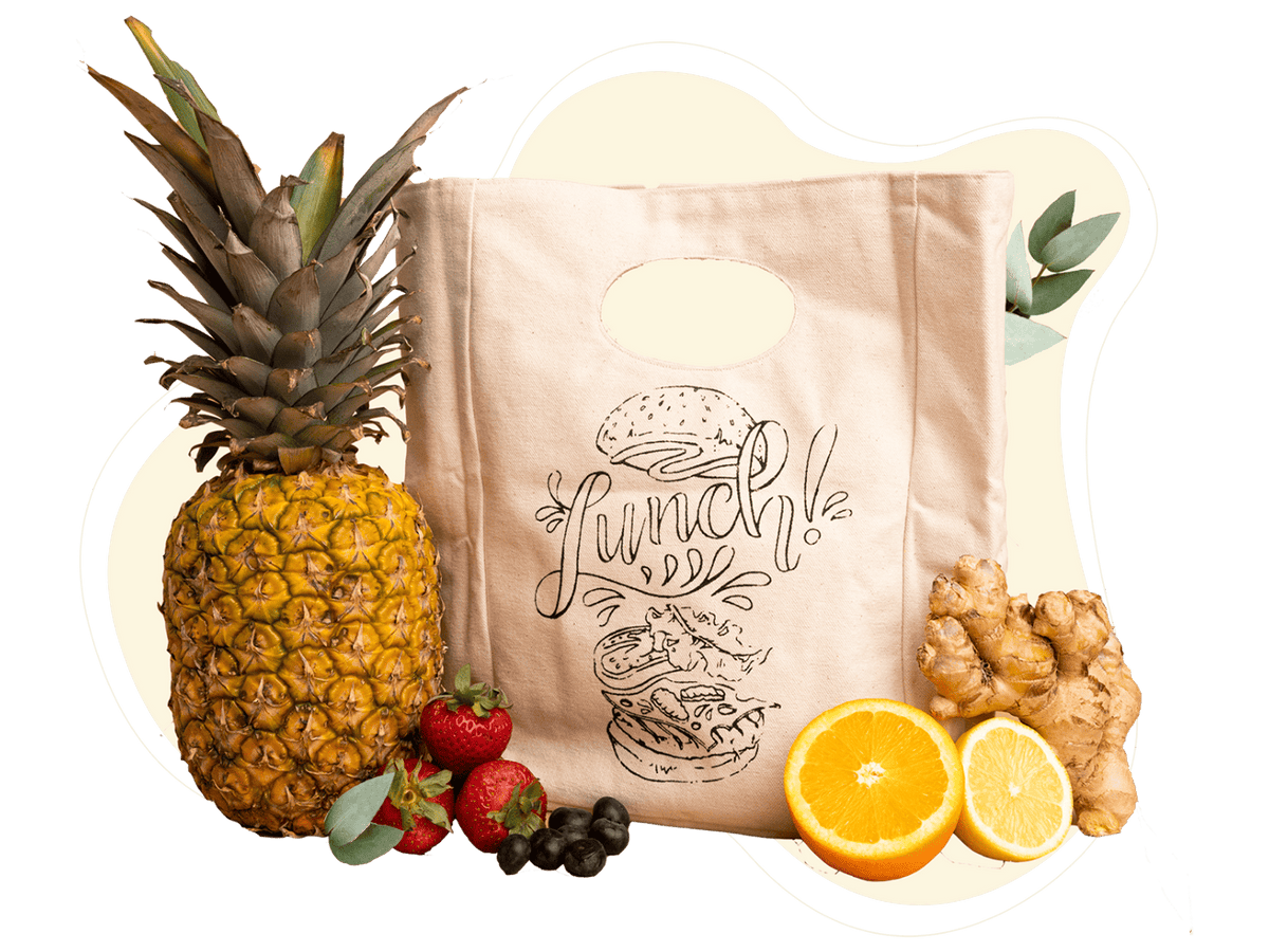 Printed canvas lunch bag beside fruit; food is not included