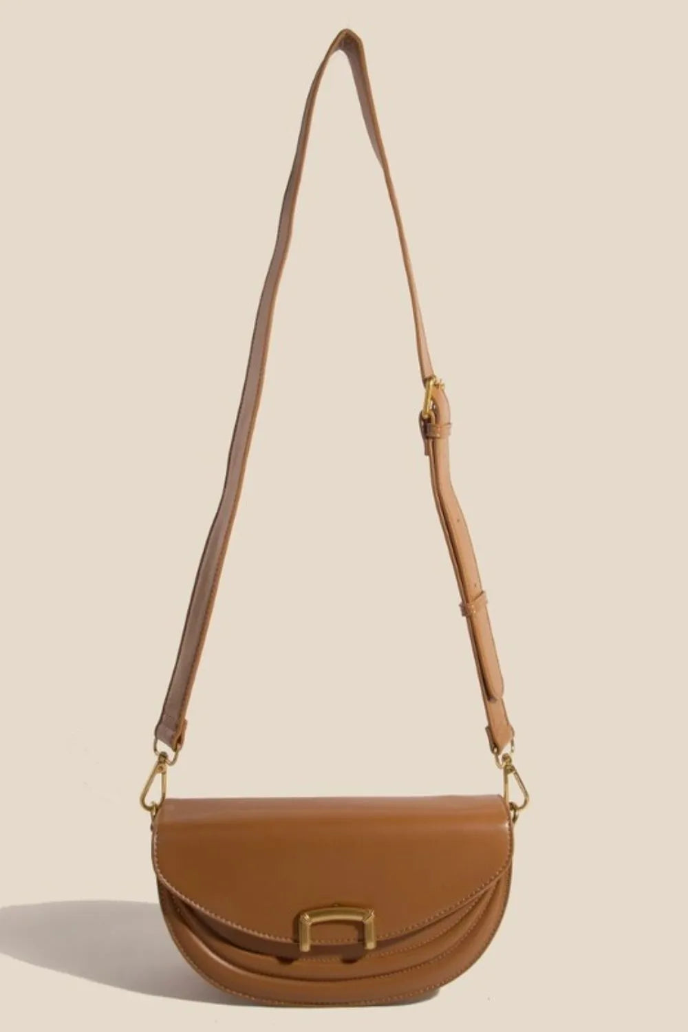 Camel crossbody bag with adjustable strap extended