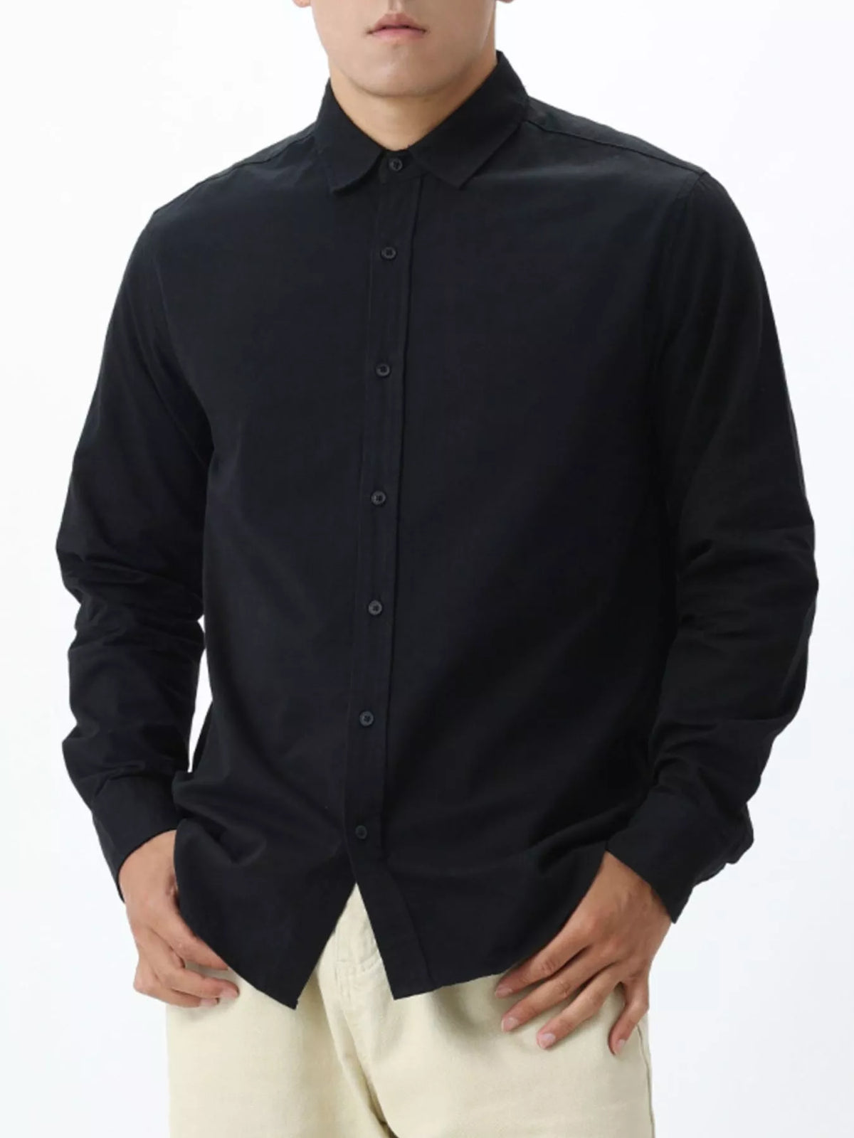 Black men’s long-sleeve button-down shirt, front view