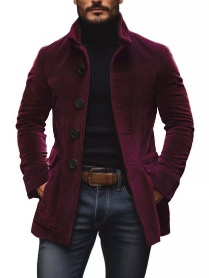 Burgundy stand-collar button-front coat with pockets, shown over a black top and trousers. Coat only.