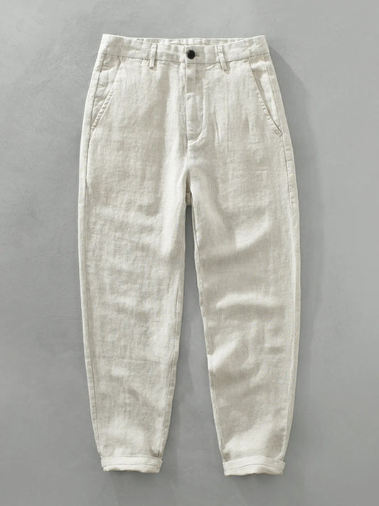 Raw hemp colour men's trousers with button waist, belt loops and rolled hems, front view