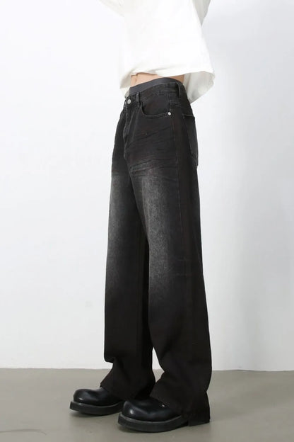 Side view of men's dark-wash loose-fit jeans.