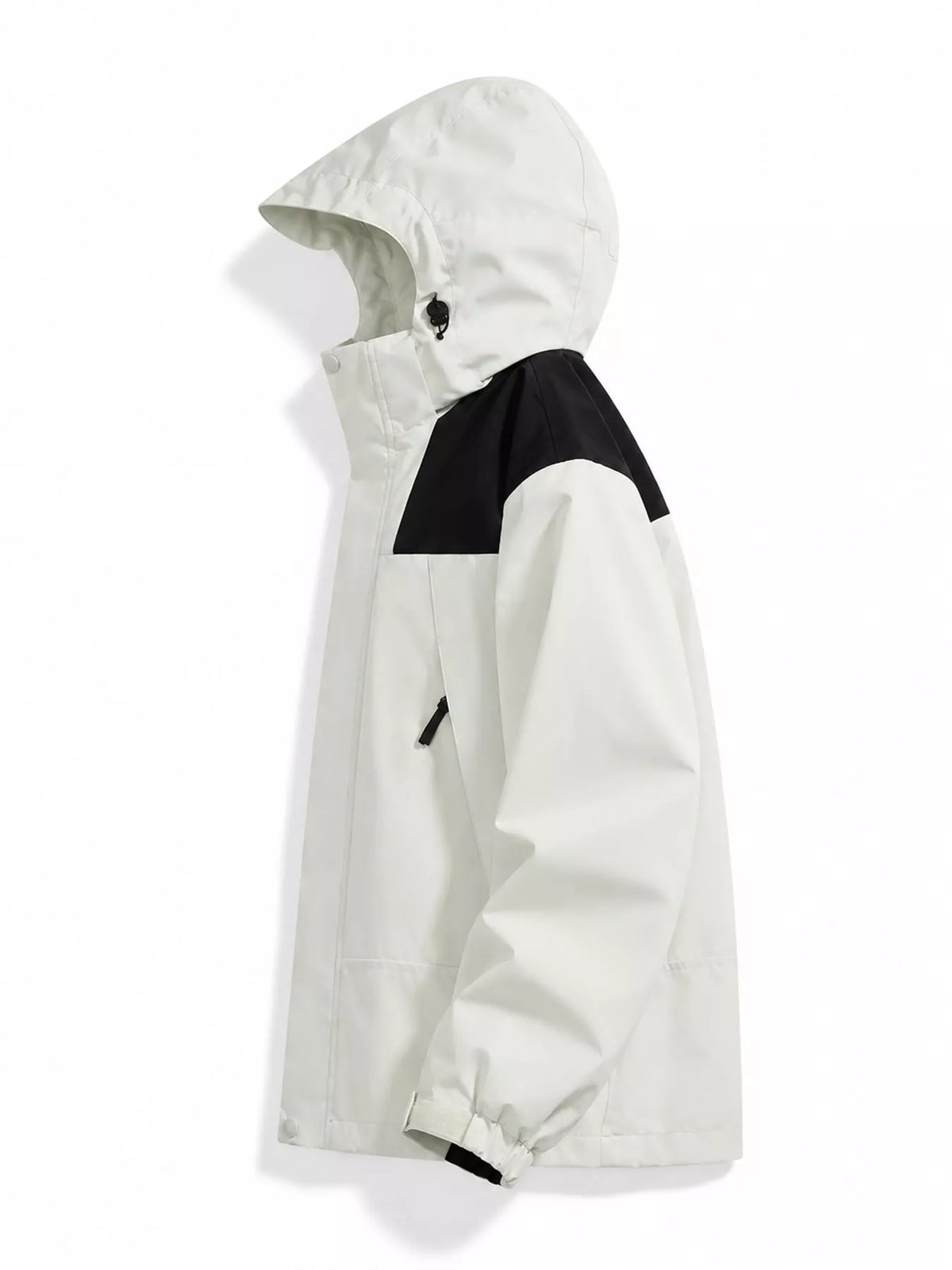 Ivory windbreaker with black shoulder panels, side view.