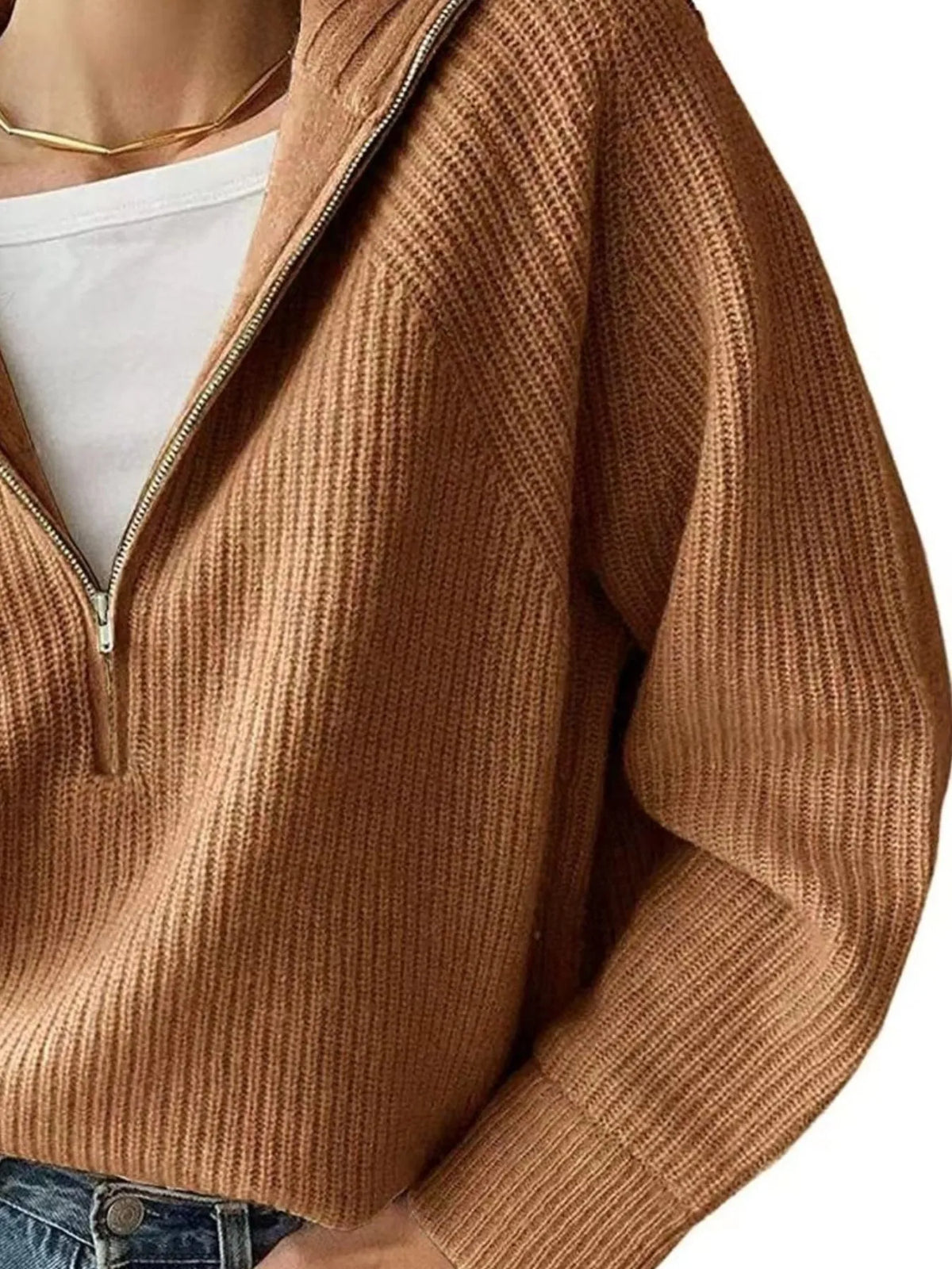 Half-zip long-sleeve ribbed sweater with a high collar.