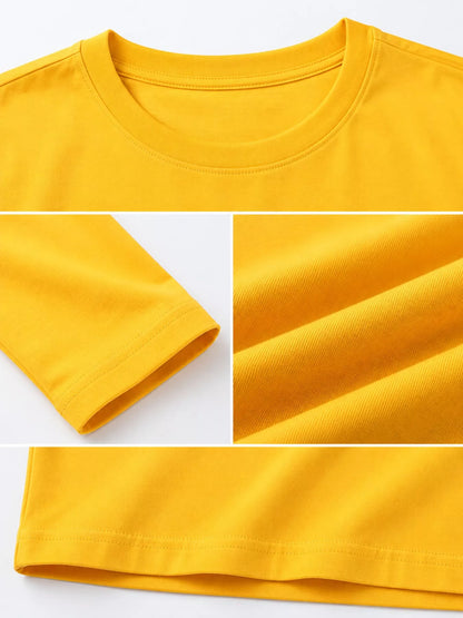 Gold men's cotton long-sleeve crewneck tee, neckline, sleeve and hem details.