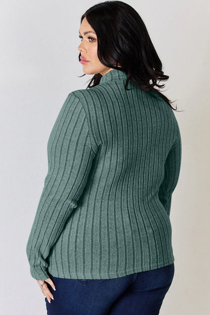 Turquoise ribbed mock-neck long-sleeve top, product view; one top included, jeans and accessories excluded