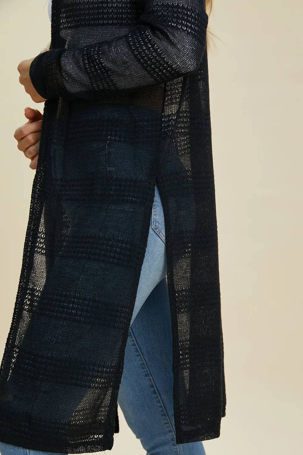 Black Double Take openwork longline cardigan — sleeve and knit detail