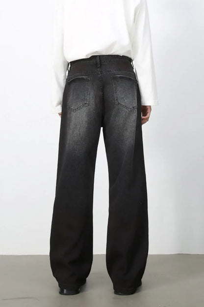 Back view of men's dark-wash loose-fit jeans and rear pockets.