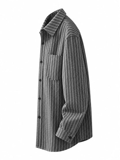 Side view of the Gray textured shacket with a buttoned cuff and curved hem.