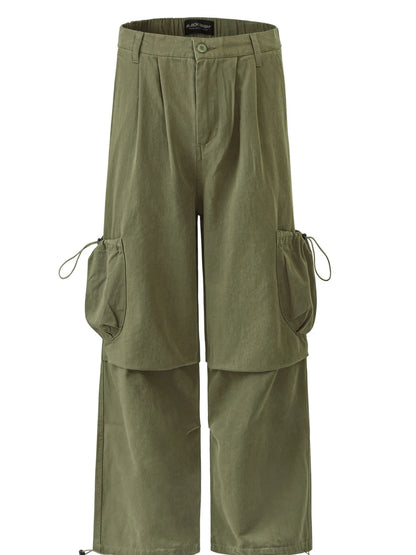 Garment-only front view of olive cargo trousers with drawcord side pockets and layered leg panels.