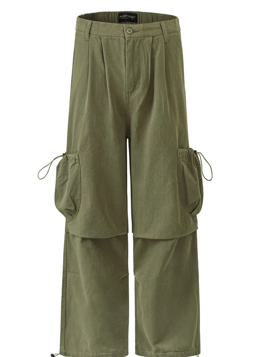 Garment-only front view of olive cargo trousers with drawcord side pockets and layered leg panels.