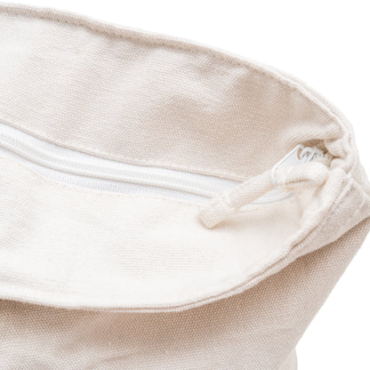 Close-up of the extra-large cotton canvas tote zipper and top seam