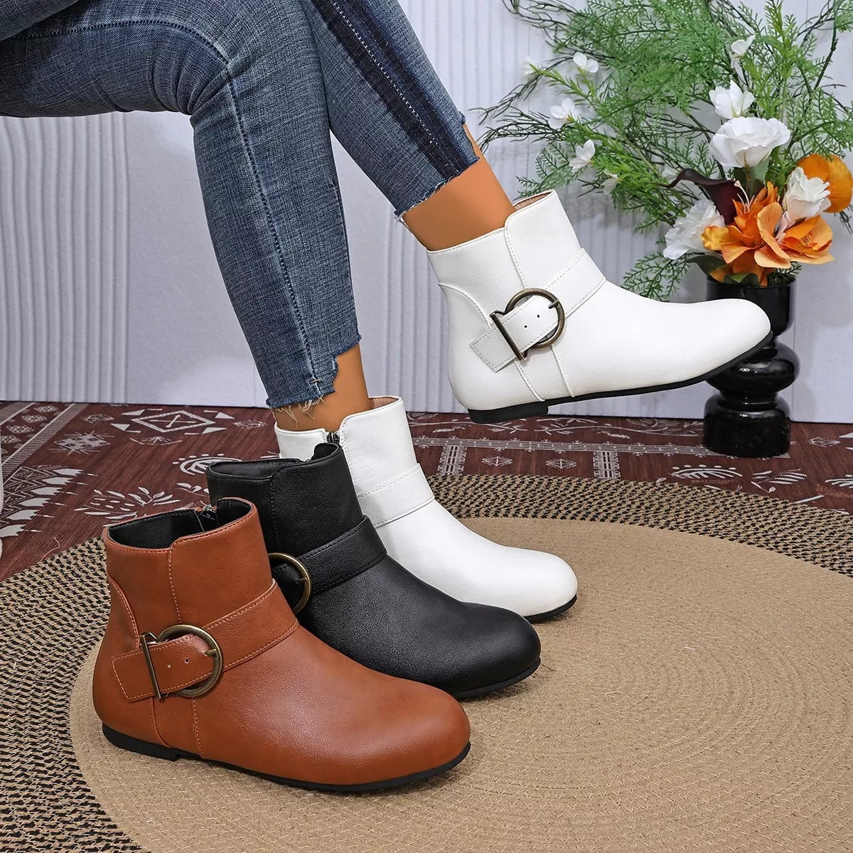 Round-toe ankle boots in Black, White and Brown with buckle details
