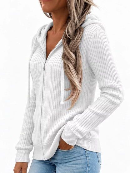 Front or angled view of the white ribbed zip-front hooded cardigan with long sleeves.