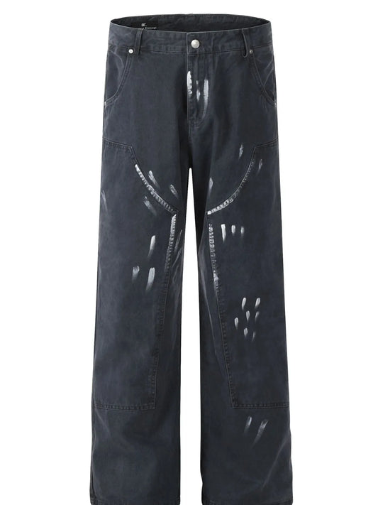 Garment-only front view of grey wide-leg trousers with curved seam panels and pale contrast markings.