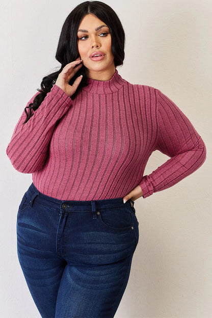 Hot Pink ribbed mock-neck long-sleeve top, product view; one top included, jeans and accessories excluded