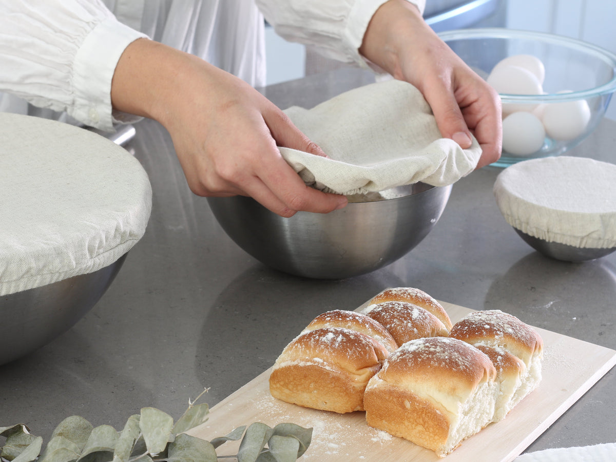Off-white elastic bowl cover used during food preparation