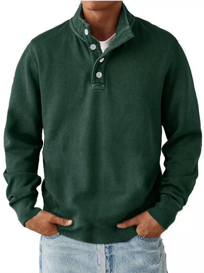 Dark Green men’s long-sleeve sweatshirt with stand collar and button placket, worn over a separate light T-shirt and jeans. One sweatshirt only.