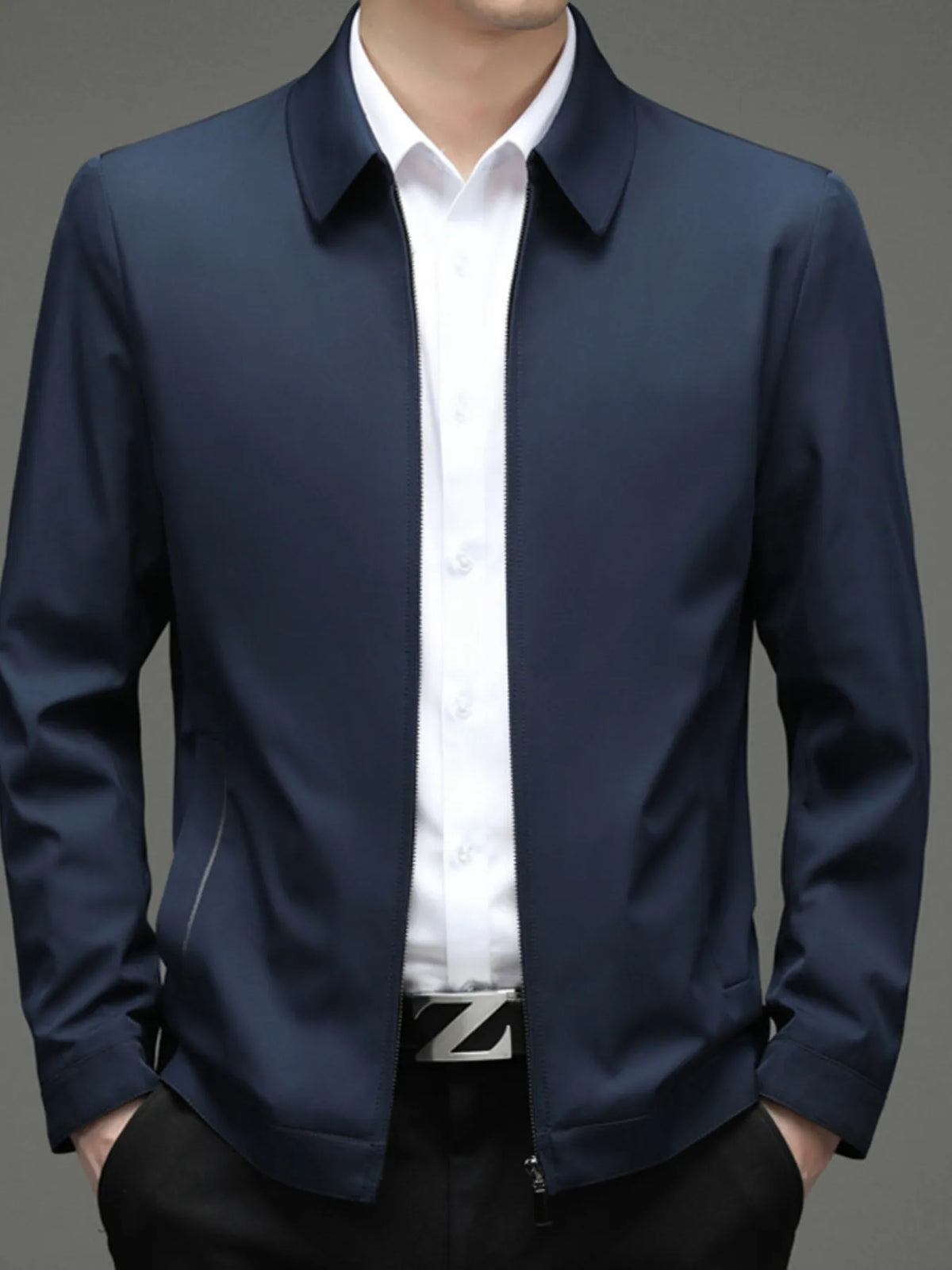 Navy blue zip-front jacket, styled front view