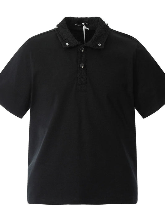 Black polo shirt showing the short button placket and collar details.