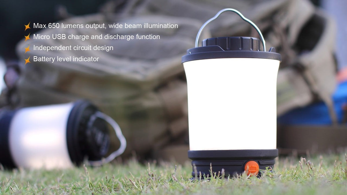 Lit Fenix CL30R lantern outdoors with feature highlights