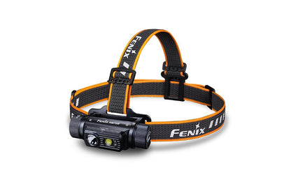 Black-and-orange Fenix HM70R headlamp with adjustable headband on a white background
