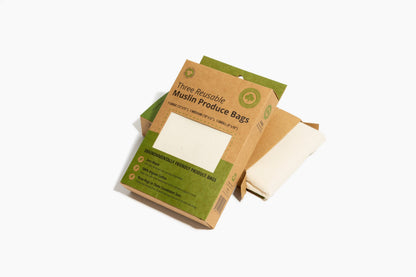 Muslin produce-bag gift box with cream fabric bags on a white background.