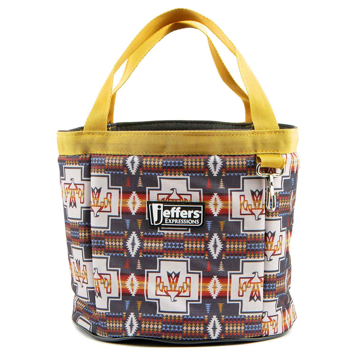 Full front view of the Jeffers Expression Thunderbird grooming tote, with geometric horse-patterned fabric, dark trim, and golden-yellow handles.