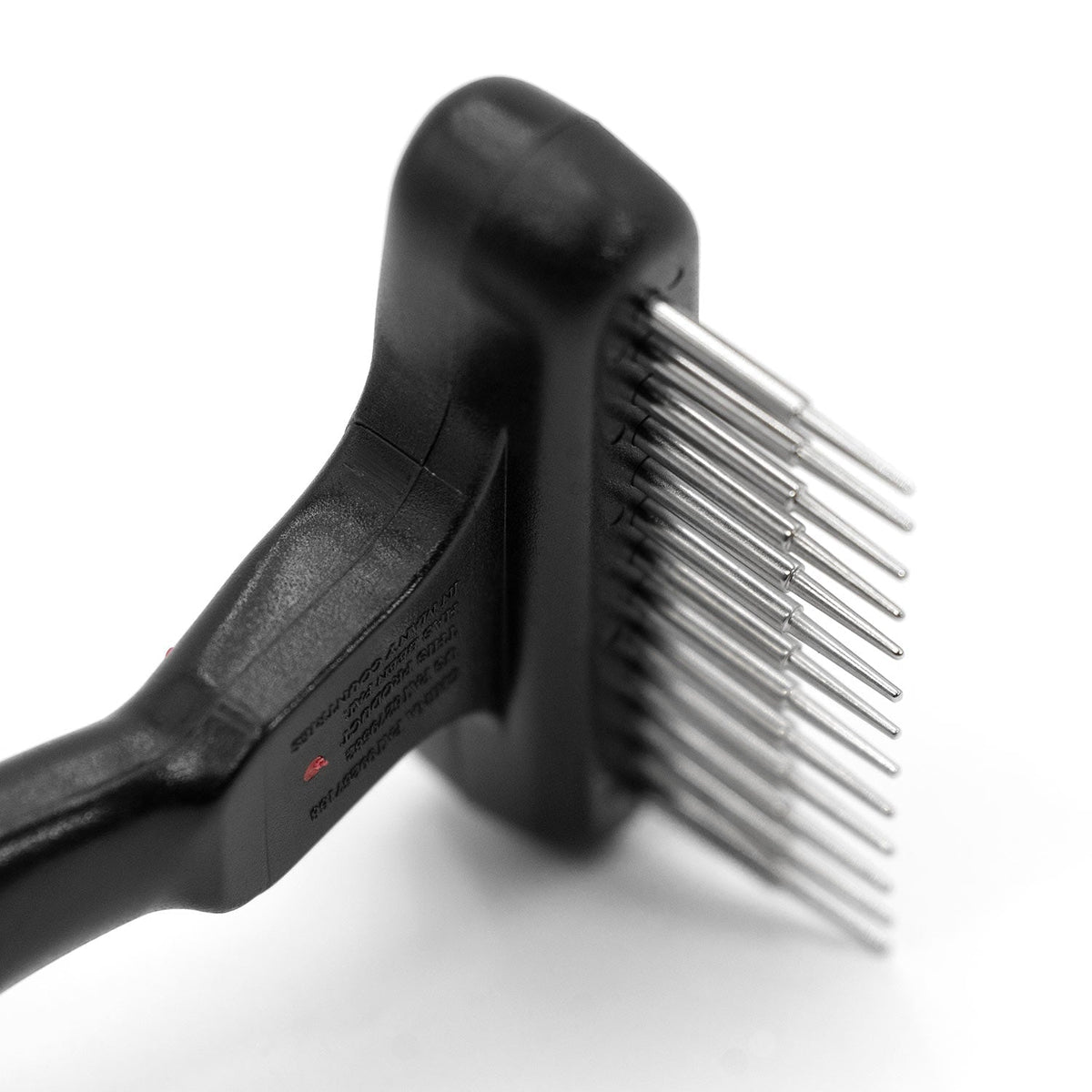 Close-up of the 13-pin head on the Jeffers single-row undercoat rake.