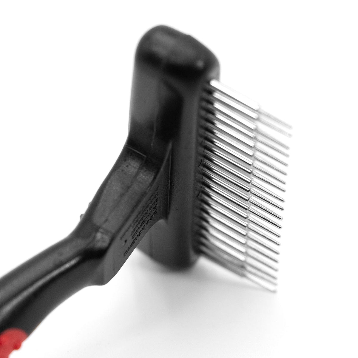 Close-up of the 20-pin head on the Jeffers undercoat rake.