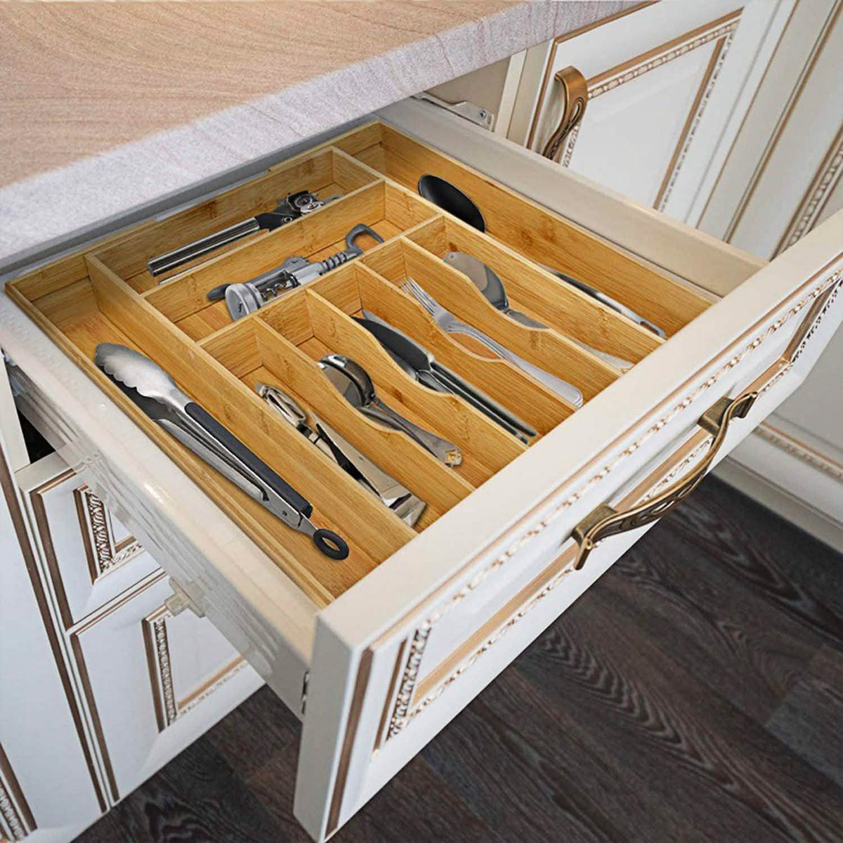 Expandable bamboo utensil organizer shown in a kitchen drawer; utensils, drawer and cabinetry are not included.