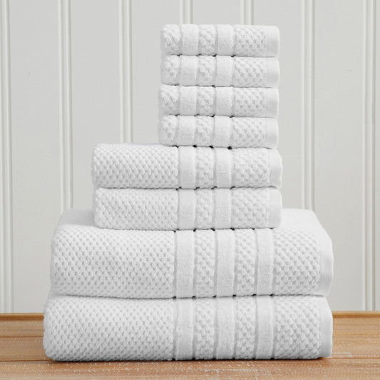 White Giuliana Collection checkered jacquard towel set folded in a stack.