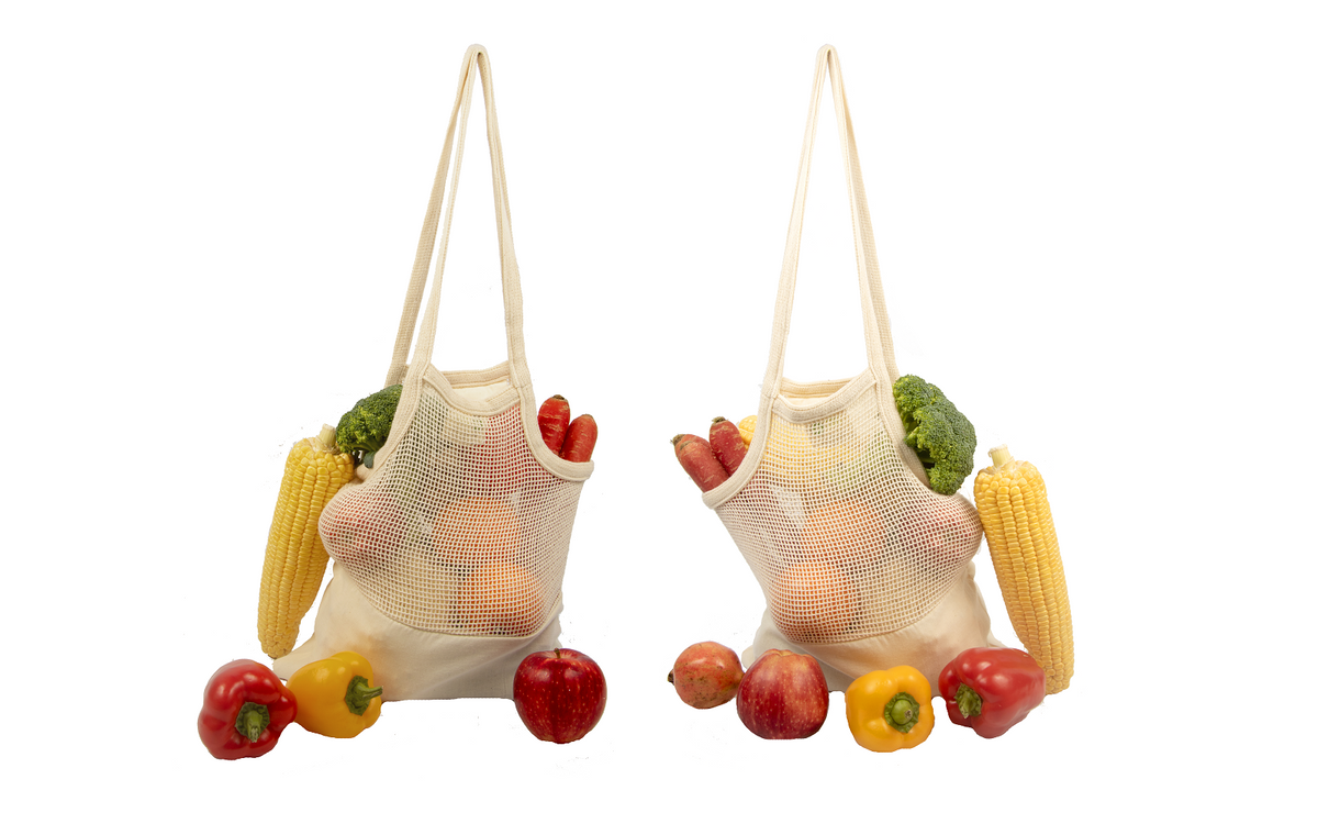 Two cotton mesh totes displayed with groceries to show the two-bag pack; produce is not included.