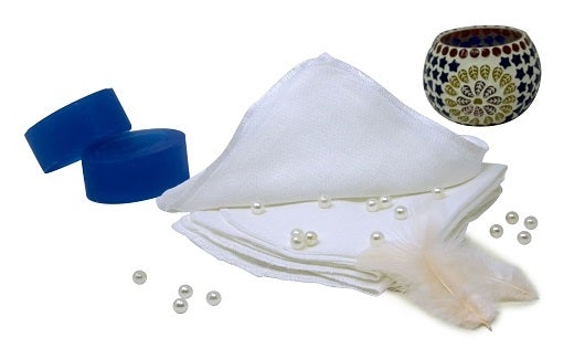 Cotton muslin cloths in a product still life; ten cloths are included, and decorative props are not included.