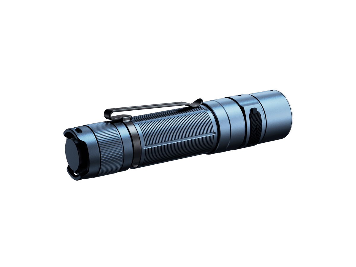 Glacier Blue Fenix E35R flashlight shown at an angle on a green background.