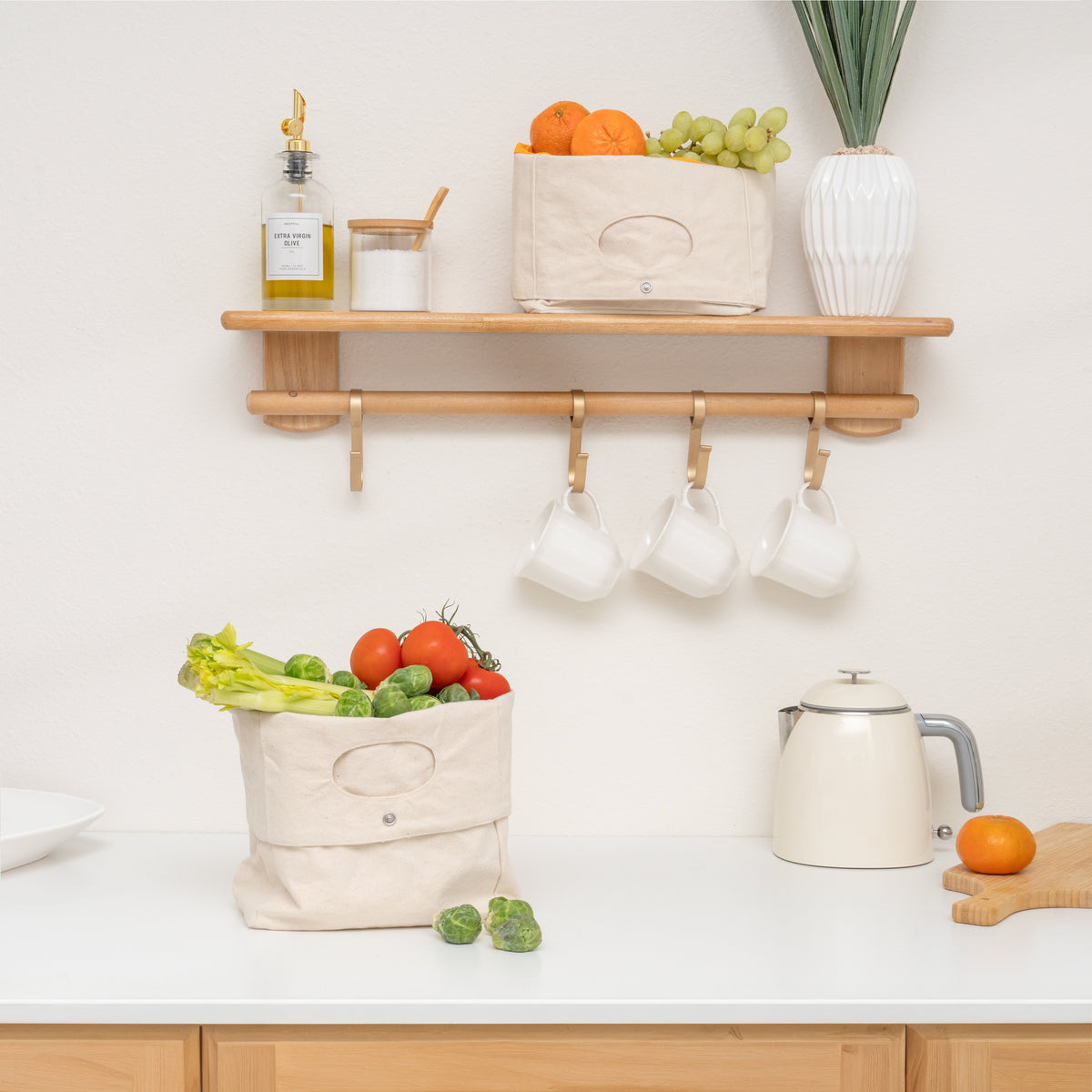 Canvas storage baskets in a kitchen scene; produce and props not included
