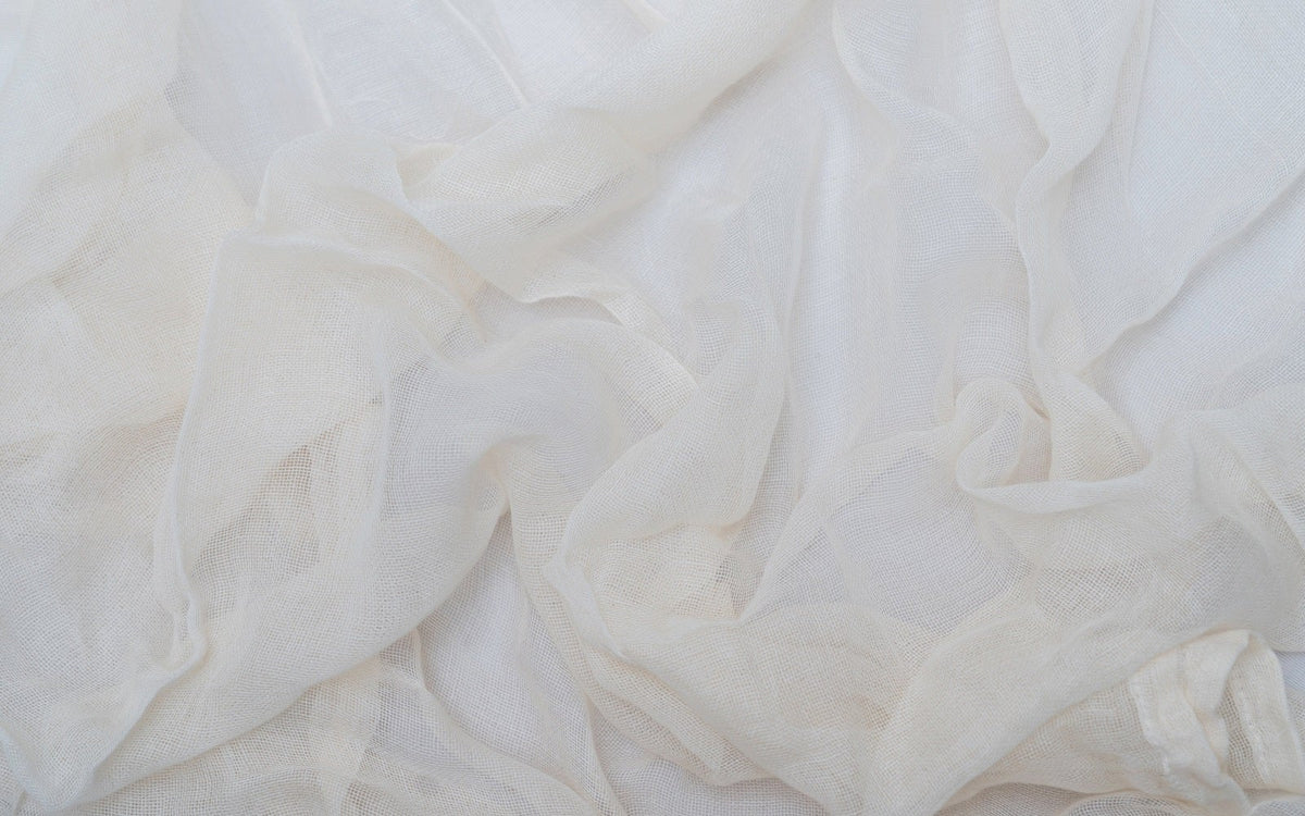 Close-up of the natural cotton cheesecloth weave.