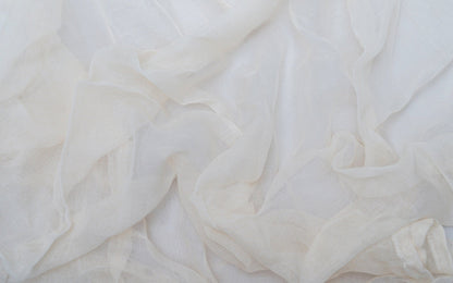 Close-up of the natural cotton cheesecloth weave.