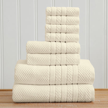 Ivory Giuliana Collection checkered jacquard towel set folded in a stack.
