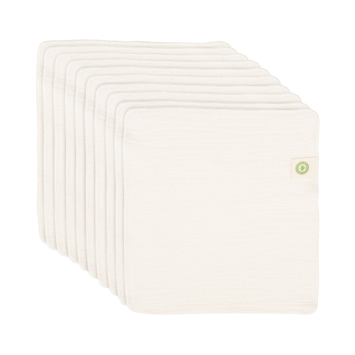 Pack of ten cream reusable cotton baby wipes fanned out on a white background