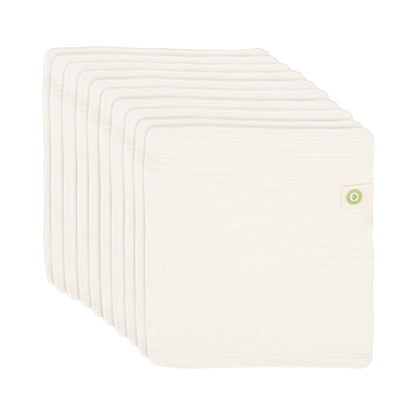 Pack of ten cream reusable cotton baby wipes fanned out on a white background