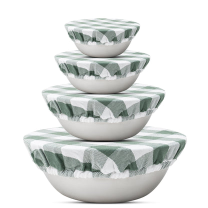 Four sage green and white checked cloth covers on graduated bowls