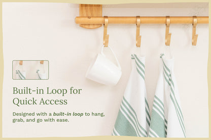 Sage green striped cotton kitchen towels — hanging loop detail; props not included