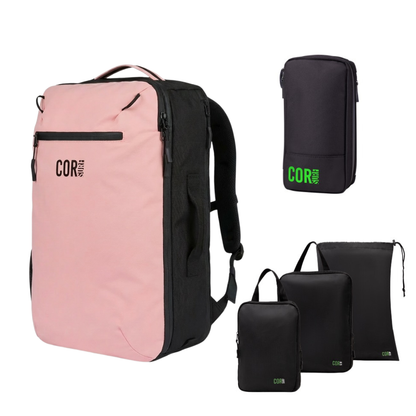 Pink 28L COR Surf backpack with black organizer bags from the travel bundle.