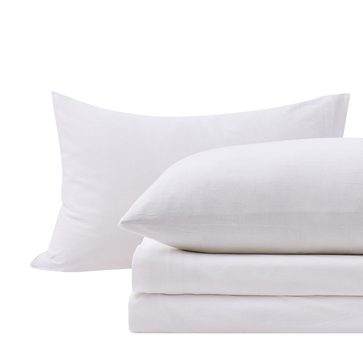 Close-up of White cotton jersey-knit pillowcases and matching sheet fabric.