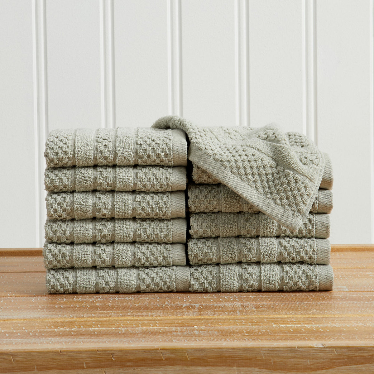 Eucalyptus Giuliana Collection checkered jacquard washcloths folded and stacked.